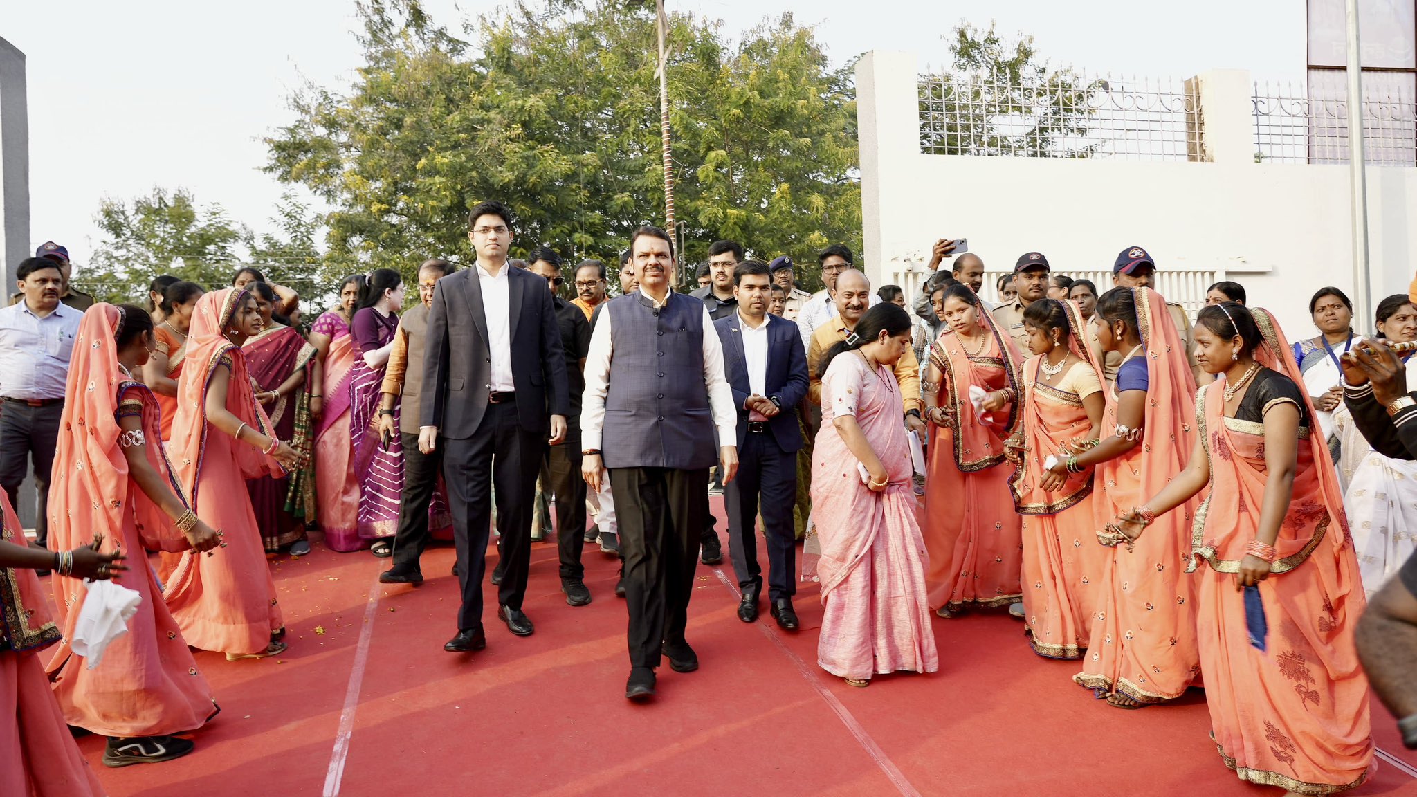 People walking on a red carpet