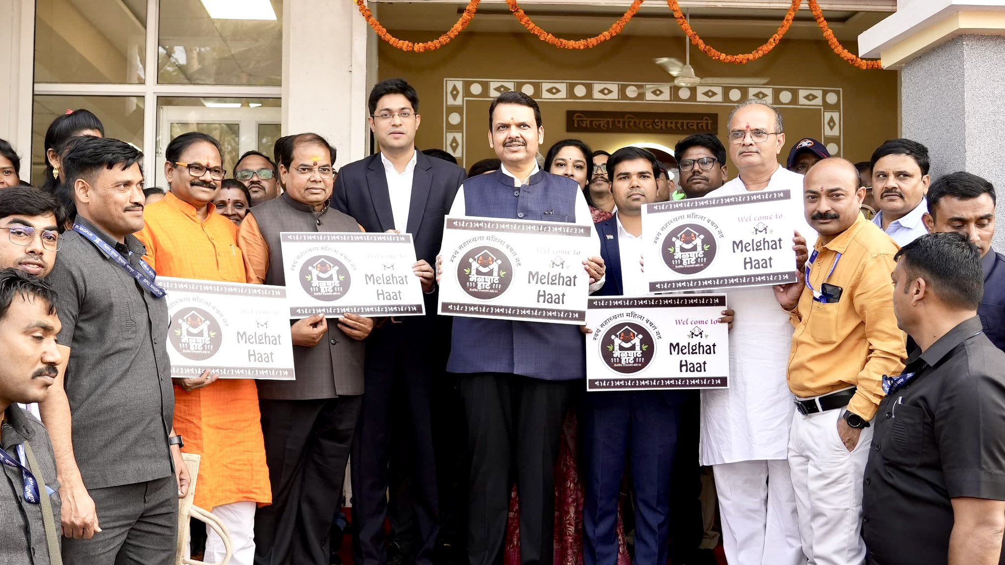Devendra Fadnavis sitting with other people